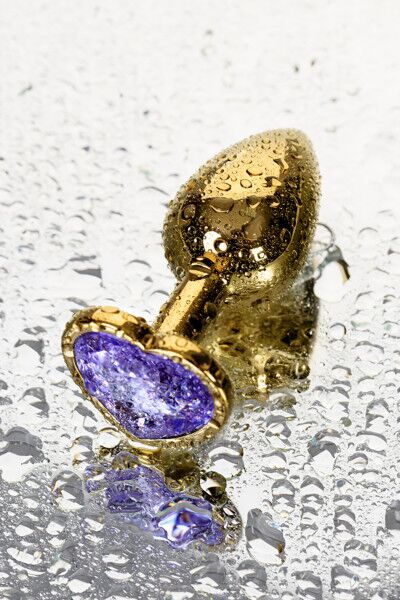 Анальная втулка TOYFA, металл, золотая, с фиолетовым кристаллом, 7 см